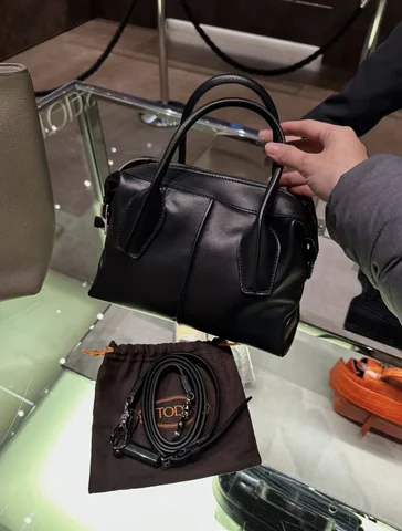 TOD’S, d-style, mini top handle bowler bag, with long strap, black